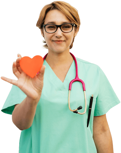 A nurse holding a heart made in card